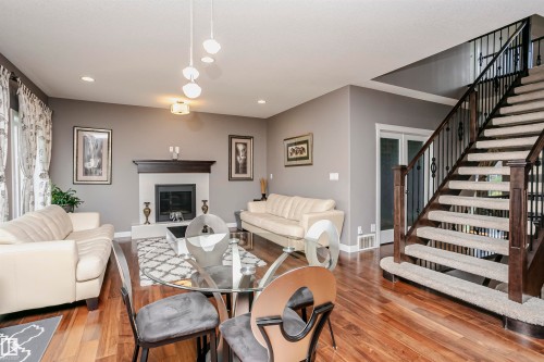 15848 13 Avenue Sw, Edmonton, AB - Indoor Photo Showing Living Room With Fireplace