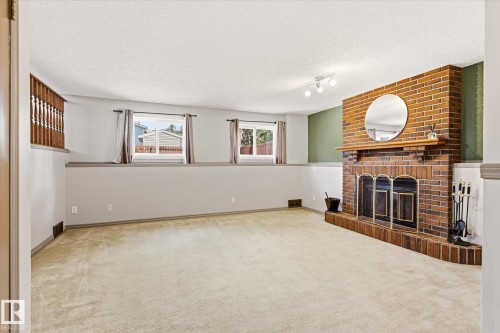 7704 152B Avenue Nw, Edmonton, AB - Indoor With Fireplace