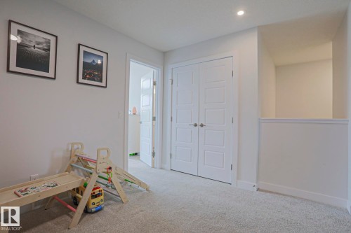 1921 Kroetsch Crescent Sw, Edmonton, AB - Indoor Photo Showing Other Room