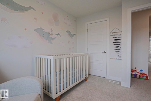 1921 Kroetsch Crescent Sw, Edmonton, AB - Indoor Photo Showing Bedroom