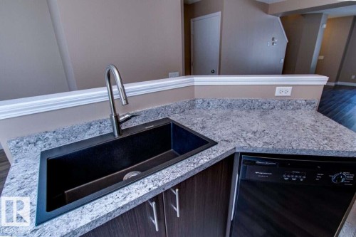 #15 8304 11 Av Sw, Edmonton, AB - Indoor Photo Showing Kitchen