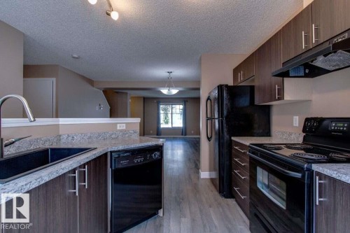 #15 8304 11 Av Sw, Edmonton, AB - Indoor Photo Showing Kitchen