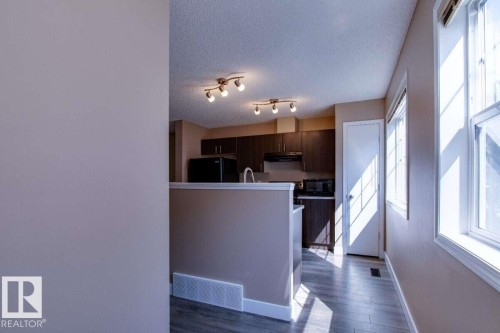 #15 8304 11 Av Sw, Edmonton, AB - Indoor Photo Showing Kitchen