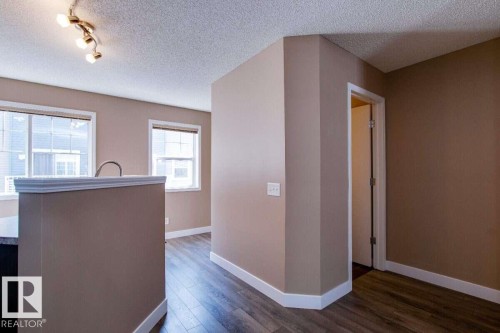 #15 8304 11 Av Sw, Edmonton, AB - Indoor Photo Showing Other Room