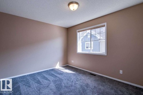 #15 8304 11 Av Sw, Edmonton, AB - Indoor Photo Showing Other Room
