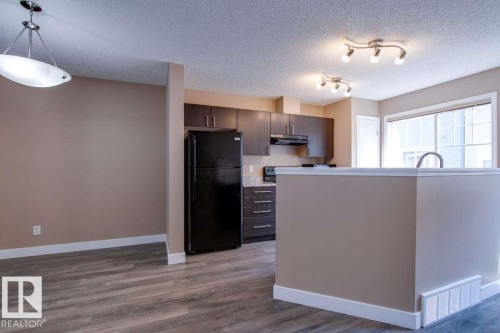 #15 8304 11 Av Sw, Edmonton, AB - Indoor Photo Showing Kitchen