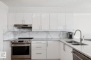 #401 10545 Saskatchewan Dr Nw, Edmonton, AB  - Indoor Photo Showing Kitchen With Double Sink With Upgraded Kitchen 