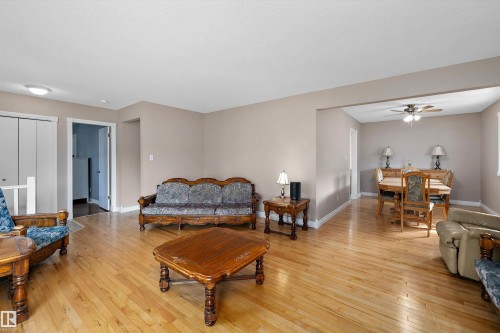 Hardwood-style flooring throughout - 3511 73 Street Nw, Edmonton, AB 