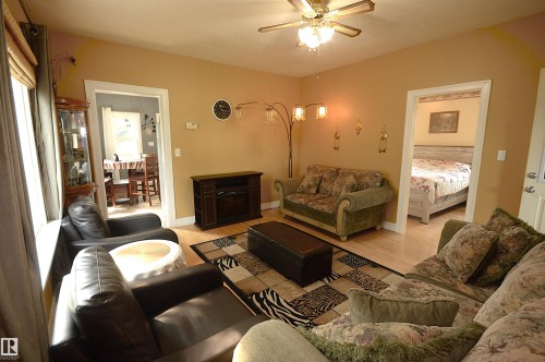 4802 50 Street, Glendon, AB - Indoor Photo Showing Living Room With Fireplace
