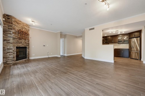 #108 11650 79 Av Nw, Edmonton, AB - Indoor With Fireplace