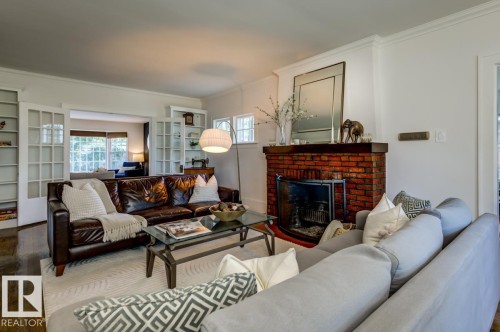 11619 Saskatchewan Drive Nw, Edmonton, AB - Indoor Photo Showing Living Room With Fireplace