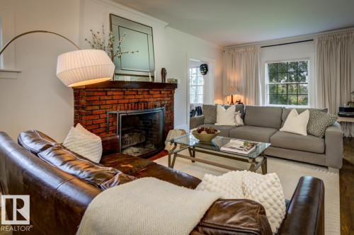 11619 Saskatchewan Drive Nw, Edmonton, AB - Indoor Photo Showing Living Room With Fireplace