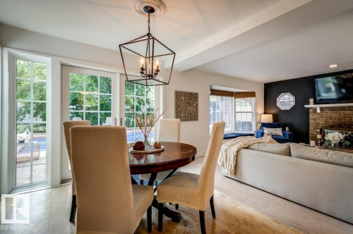 11619 Saskatchewan Drive Nw, Edmonton, AB - Indoor Photo Showing Dining Room With Fireplace