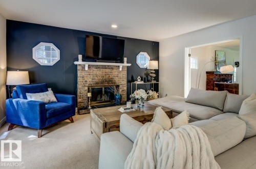 11619 Saskatchewan Drive Nw, Edmonton, AB - Indoor Photo Showing Living Room With Fireplace