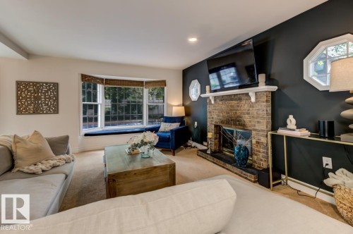 11619 Saskatchewan Drive Nw, Edmonton, AB - Indoor Photo Showing Living Room With Fireplace