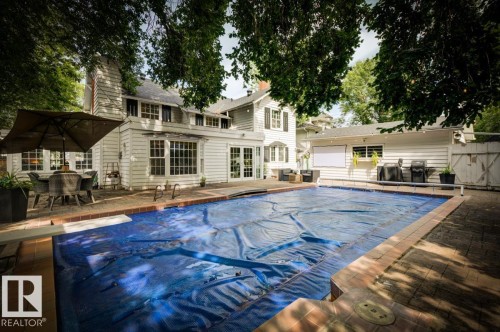 11619 Saskatchewan Drive Nw, Edmonton, AB - Outdoor With In Ground Pool
