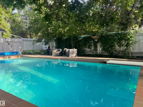 11619 Saskatchewan Drive Nw, Edmonton, AB - Outdoor With In Ground Pool With Backyard