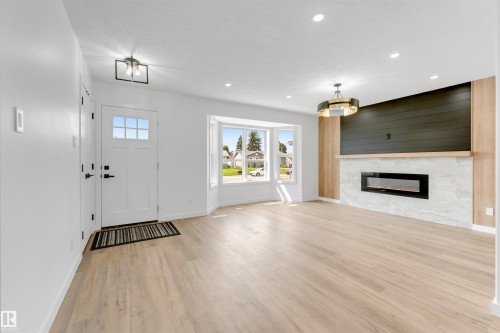 6404 88 Avenue Nw, Edmonton, AB - Indoor Photo Showing Living Room With Fireplace