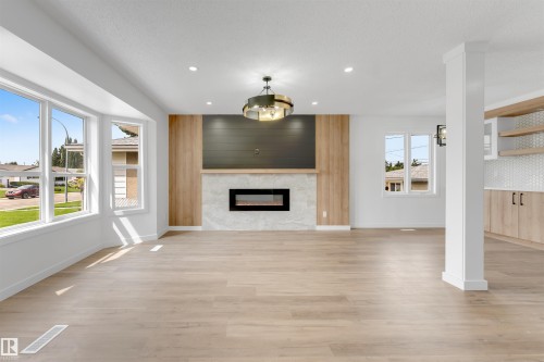 6404 88 Avenue Nw, Edmonton, AB - Indoor Photo Showing Other Room With Fireplace