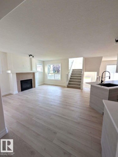 1236 Westerra Crescent, Stony Plain, AB - Indoor Photo Showing Living Room With Fireplace