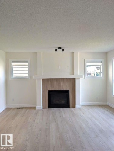 1236 Westerra Crescent, Stony Plain, AB - Indoor Photo Showing Living Room With Fireplace