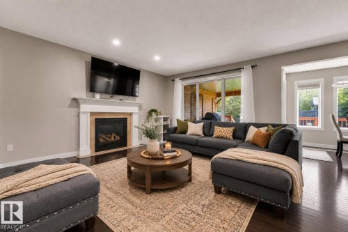 3433 Goodridge Link Link Nw, Edmonton, AB - Indoor Photo Showing Living Room With Fireplace