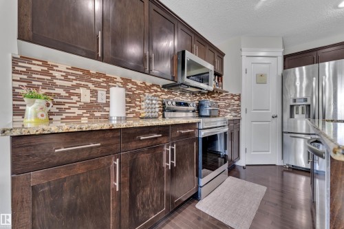 3433 Goodridge Link Link Nw, Edmonton, AB - Indoor Photo Showing Kitchen With Stainless Steel Kitchen With Upgraded Kitchen