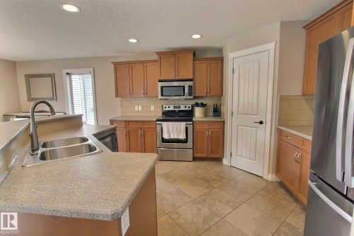 10 Birchmont Crescent, Leduc, AB - Indoor Photo Showing Kitchen With Double Sink