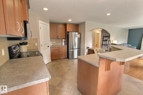 10 Birchmont Crescent, Leduc, AB - Indoor Photo Showing Kitchen With Double Sink