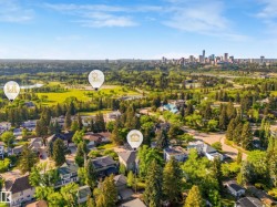 Expansive green spaces and mature trees surrounding the property - 