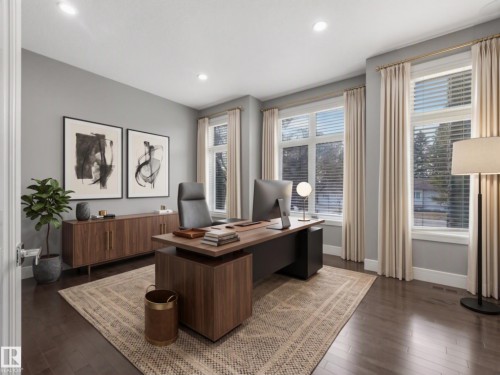 Recessed lighting, wood-finish flooring, and multiple windows with blinds and drapes - 8927 120 Street Nw, Edmonton, AB - Indoor