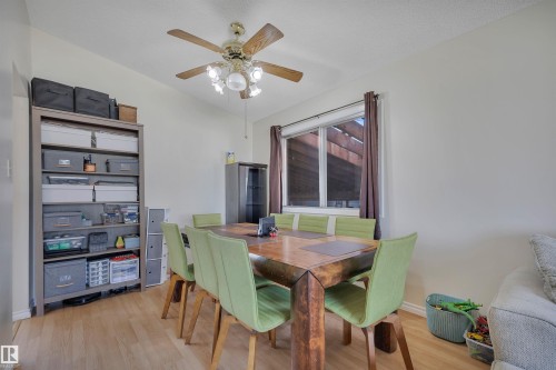 Wood-finish flooring throughout - 5411 44 Ave, Wetaskiwin, AB - Indoor Photo Showing Dining Room