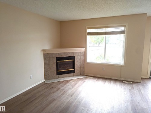#26 13403 Cumberland Rd Nw, Edmonton, AB - Indoor Photo Showing Living Room With Fireplace