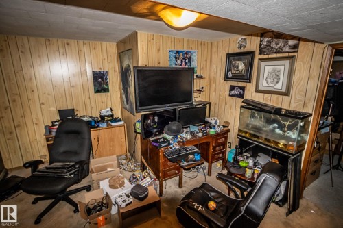 Additional content - 4322 49 Ave, St. Paul Town, AB - Indoor Photo Showing Other Room With Fireplace