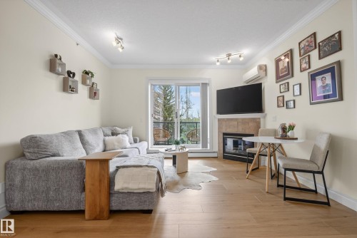 #303 8631 108 St Nw, Edmonton, AB - Indoor Photo Showing Living Room