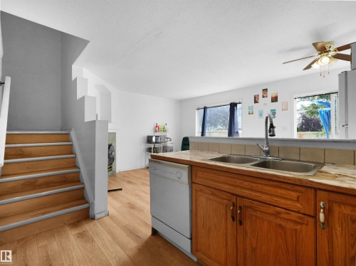 #9 16933 115 St Nw, Edmonton, AB - Indoor Photo Showing Kitchen With Double Sink