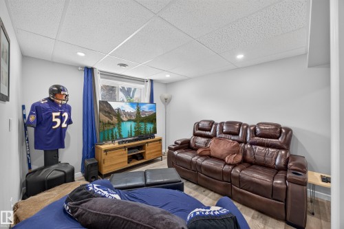 Recessed lighting, drop ceiling, wood-finish flooring, and a single window - 156 Clareview Road Nw, Edmonton, AB - Indoor