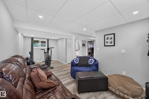 Recessed lighting, wood-finish flooring, drop ceiling, and light gray wall paint - 156 Clareview Road Nw, Edmonton, AB - Indoor