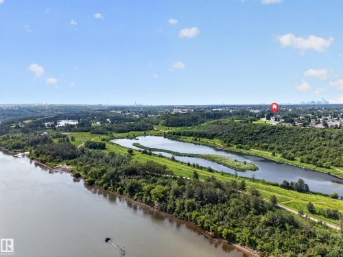 Expansive natural landscape featuring a prominent river, multiple serene lakes, dense mature trees, and open green spaces - 156 Clareview Road Nw, Edmonton, AB - Outdoor With Body Of Water With View