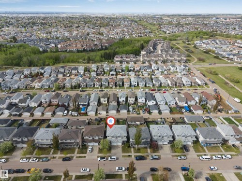 Neighborhood setting with residential homes and green spaces - 3032 31 Avenue Nw, Edmonton, AB - Outdoor With View
