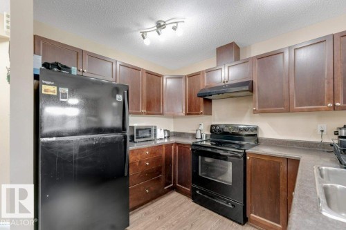 3514 16 Street Nw, Edmonton, AB - Indoor Photo Showing Kitchen With Double Sink