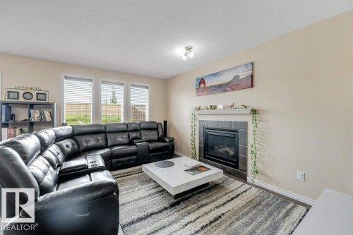 3514 16 Street Nw, Edmonton, AB - Indoor Photo Showing Living Room With Fireplace