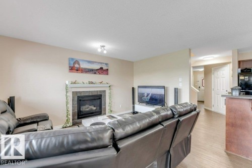 3514 16 Street Nw, Edmonton, AB - Indoor Photo Showing Living Room With Fireplace