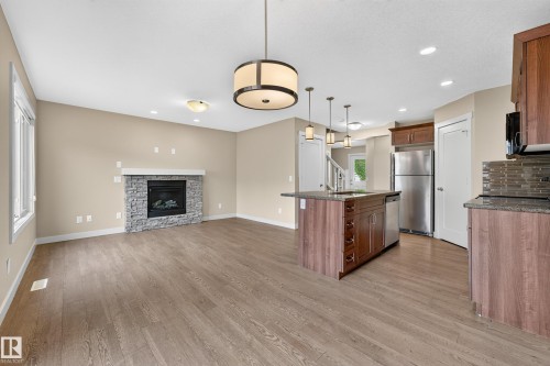 2730 Sparrow Place Nw, Edmonton, AB - Indoor With Fireplace