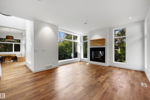 9342 83 Avenue Nw, Edmonton, AB - Indoor Photo Showing Living Room With Fireplace