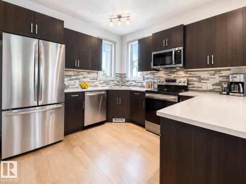 16464 15 Avenue Sw, Edmonton, AB - Indoor Photo Showing Kitchen With Upgraded Kitchen