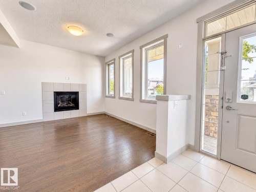 16464 15 Avenue Sw, Edmonton, AB - Indoor With Fireplace