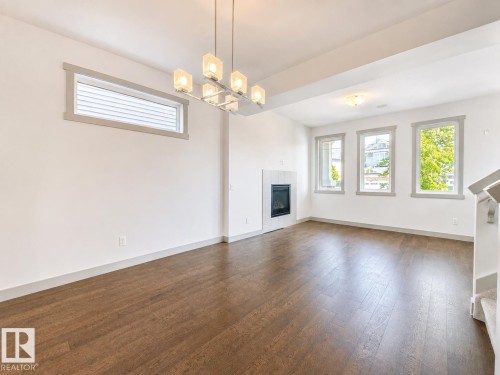 16464 15 Avenue Sw, Edmonton, AB - Indoor With Fireplace