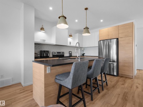 4597 66 Street, Beaumont, AB - Indoor Photo Showing Kitchen With Upgraded Kitchen