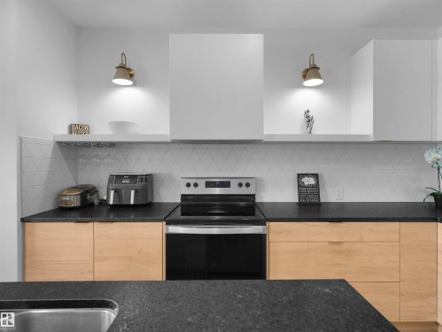 4597 66 Street, Beaumont, AB - Indoor Photo Showing Kitchen With Double Sink With Upgraded Kitchen